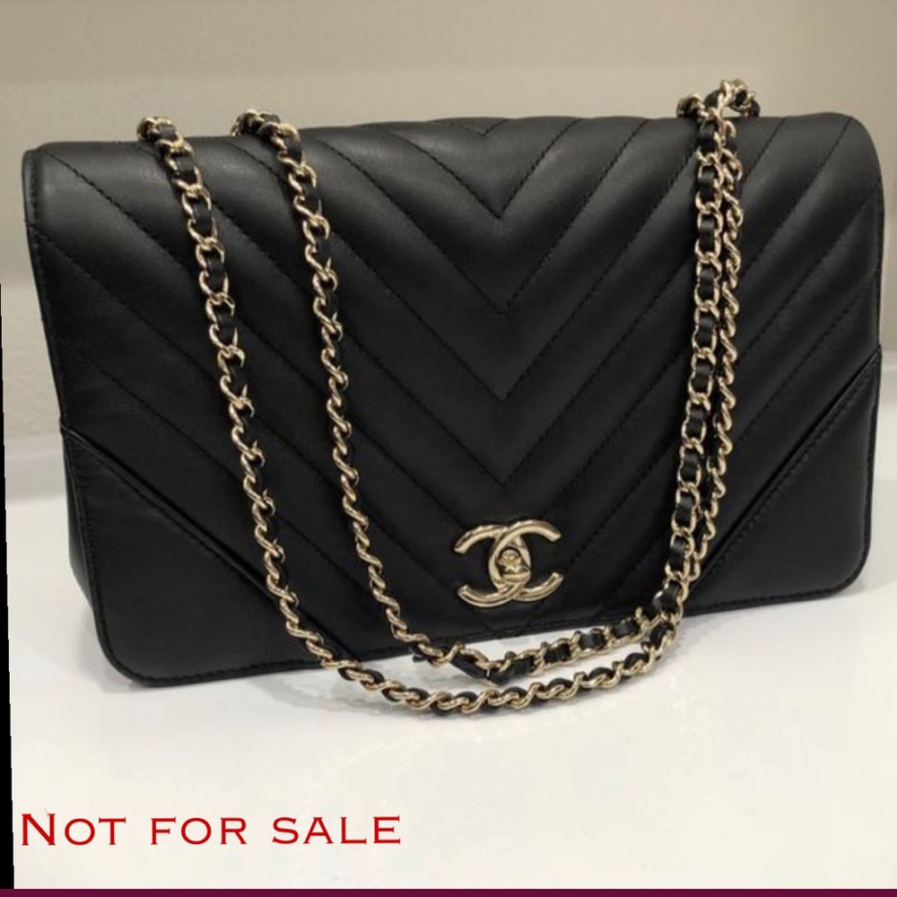 Authentic black Chanel statement flap bag